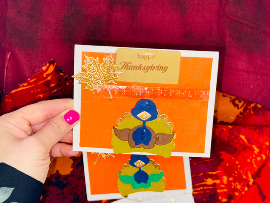 Thanksgiving-themed greeting card. autumn leaves  "happy Thanksgiving" message with embossed leaf and a 4 layers of a turkey